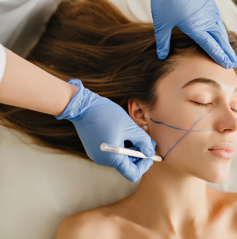 closeup-portrait-beautiful-woman-cosmetology-procedures-rejuvenation-beauty-salon-dermatology-procedure-painting-eyebrows-hands-blue-glows-work-healthcare-botox-min